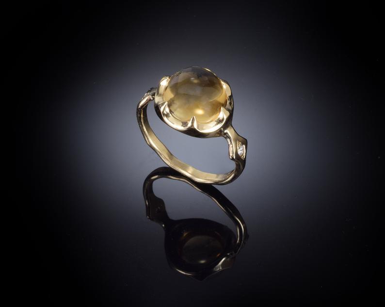 Citrine ring, 14 karat gold ring with gem stone and diamonds.